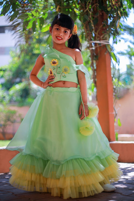 Sunflower one shouldered Green Top with tiered Lehenga
