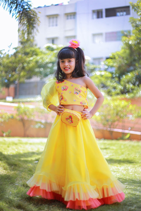 Yellow One Sleeves Sequins Choli with tiered lehenga and belt bag